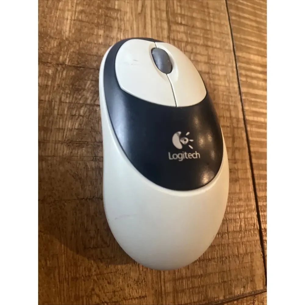 Logitech M-RN67 Optical Mouse White Cordless 2-Button Scroll. No Receiver